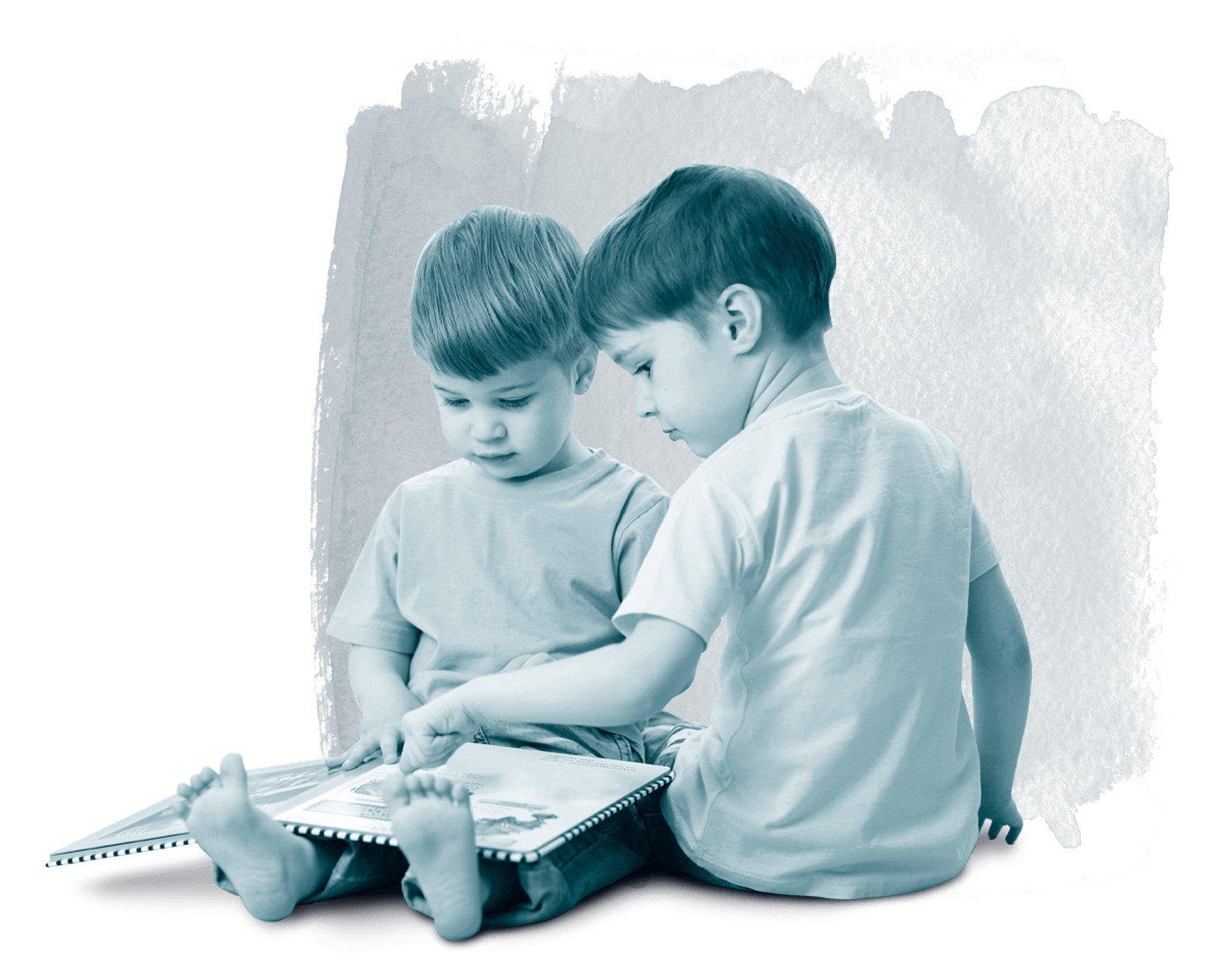 Two boys looking at a book